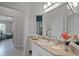 Bathroom featuring a large mirror, vanity with sink, and neutral countertops at 224 Bluestone Pl, Casselberry, FL 32707