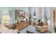Cozy living room showcasing tile floors, a buffet table, and a comfortable reading nook at 224 Bluestone Pl, Casselberry, FL 32707