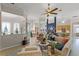 Spacious open floor plan featuring tile floors, comfortable seating, and a breakfast bar area at 224 Bluestone Pl, Casselberry, FL 32707