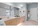 The main bathroom includes double sinks, a framed mirror, and lots of storage space at 224 Bluestone Pl, Casselberry, FL 32707