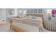 The main bedroom features a sitting area, ensuite bathroom, and soft lighting for a relaxing retreat at 224 Bluestone Pl, Casselberry, FL 32707