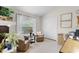Bright home office space featuring two chairs, a desk and large closet at 224 Bluestone Pl, Casselberry, FL 32707