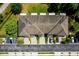 Aerial view of the community townhouse building with front parking at 2743 River Landing Dr, Sanford, FL 32771