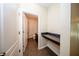 Neutral toned half bath with a wooden vanity at 2743 River Landing Dr, Sanford, FL 32771