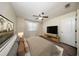 Cozy bedroom with a ceiling fan, wood floors, and a plush bed at 2743 River Landing Dr, Sanford, FL 32771