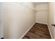 Walk-in closet with wood flooring and wire shelving at 2743 River Landing Dr, Sanford, FL 32771