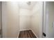 The walk in closet has hardwood floors, white walls, and wire shelving at 2743 River Landing Dr, Sanford, FL 32771