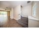 Bright foyer offers access to the living area, staircase, and features ceramic tile flooring at 2743 River Landing Dr, Sanford, FL 32771
