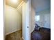 Hallway view with stairway and entry door leading to additional rooms at 2743 River Landing Dr, Sanford, FL 32771