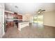 Well-equipped kitchen features stainless steel appliances, ample counter space, and a seamless flow to the outdoors at 2743 River Landing Dr, Sanford, FL 32771