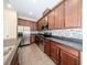 Gourmet kitchen with stainless steel appliances, stylish backsplash, and ample counter space at 2743 River Landing Dr, Sanford, FL 32771