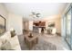 Open-concept living area featuring tile flooring and abundant natural light at 2743 River Landing Dr, Sanford, FL 32771