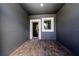 Cozy outdoor patio featuring brick flooring and natural light at 2743 River Landing Dr, Sanford, FL 32771