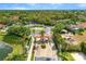 Aerial view of the neighborhood entrance showing a fountain and lush landscaping at 2769 Lido Key Dr, Kissimmee, FL 34747