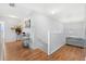 Upstairs landing featuring hardwood floors and seating area at 2769 Lido Key Dr, Kissimmee, FL 34747