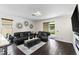 Comfortable living area with wood floors and a large sliding door to the outside at 3138 Twin Shore Ln, Orlando, FL 32824