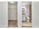 Conveniently located bathroom with vanity sink next to a walk-in closet offering storage and functionality at 3914 Sw 161St Loop, Ocala, FL 34473