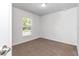 Bedroom with a window, neutral carpet and white walls provides ample natural light at 3914 Sw 161St Loop, Ocala, FL 34473