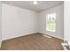 Bedroom with carpet, neutral walls, window view, and natural light at 3914 Sw 161St Loop, Ocala, FL 34473