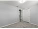 A carpeted bedroom offers a closet for storage at 4070 Mcneil Rd, Apopka, FL 32703