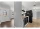 Bright kitchen with modern appliances, white cabinetry, and neutral countertops offers a functional design at 4070 Mcneil Rd, Apopka, FL 32703