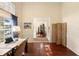 Bright office with a large window, stylish desk, and views to other rooms at 4199 Conway Place Cir, Orlando, FL 32812