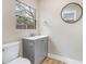 Cozy bathroom with modern vanity and updated fixtures at 451 E 5Th St, Chuluota, FL 32766