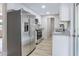 Modern kitchen with stainless steel appliances and granite countertops at 451 E 5Th St, Chuluota, FL 32766