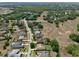 Bird's eye view of a neighborhood featuring spacious lots and serene surroundings at 525 Hebrides Ct, Apopka, FL 32712