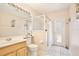 Bathroom featuring a glass-enclosed shower, modern lighting, and decorative accents at 525 Hebrides Ct, Apopka, FL 32712