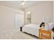 Bright bedroom featuring a closet, a window and carpet flooring at 525 Hebrides Ct, Apopka, FL 32712