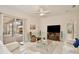 Bright and open living room leading to a screened patio and featuring tile flooring at 525 Hebrides Ct, Apopka, FL 32712