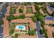 Overhead view highlighting the community pool, landscaping and ample parking at 5325 Hansel Ave # E-15, Orlando, FL 32809