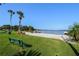 This relaxing beach view offers a peaceful escape with its sandy shore and calm waters at 5325 Hansel Ave # E-15, Orlando, FL 32809