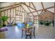 The lounge area boasts high ceilings, wood beams, and a fireplace, perfect for gatherings at 5325 Hansel Ave # E-15, Orlando, FL 32809