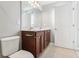 Bathroom featuring vanity, tile floors, and toilet at 6013 Blue Lily Way, Winter Garden, FL 34787