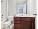 Bathroom with vanity, toilet, and combination tub/shower at 6013 Blue Lily Way, Winter Garden, FL 34787