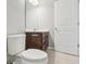 Bathroom featuring vanity, toilet, and tile flooring at 6013 Blue Lily Way, Winter Garden, FL 34787