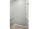 Carpeted staircase leading to the second floor with white railing and baseboards at 6013 Blue Lily Way, Winter Garden, FL 34787