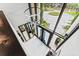 A view of the foyer with modern chandelier and tall front door at 608 E Club Cir, Longwood, FL 32779