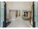 Open foyer featuring tiled floors, modern decor, and lots of bright, natural light at 608 E Club Cir, Longwood, FL 32779