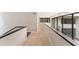 Hallway with view of courtyard through glass windows at 608 E Club Cir, Longwood, FL 32779