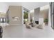 Bright living room with fireplace, high ceilings, tile floor and large windows at 608 E Club Cir, Longwood, FL 32779