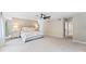 Comfortable primary bedroom with carpet flooring, and a queen-size bed at 608 E Club Cir, Longwood, FL 32779