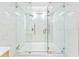 Modern shower with dual shower heads and beautiful glass enclosure at 608 E Club Cir, Longwood, FL 32779