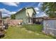 Backyard with an attached patio at 645 Upperriver Ct, Orlando, FL 32828