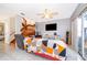 Bright living area with sliding glass doors that provide natural light and access to outdoor space at 645 Upperriver Ct, Orlando, FL 32828