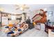 Bright open-concept living area with the kitchen visible at 645 Upperriver Ct, Orlando, FL 32828