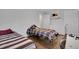 Bedroom with wood-look floors and closet at 6464 Inca St, Orlando, FL 32807