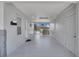 A spacious carport or covered outdoor space that leads to the backyard at 6464 Inca St, Orlando, FL 32807